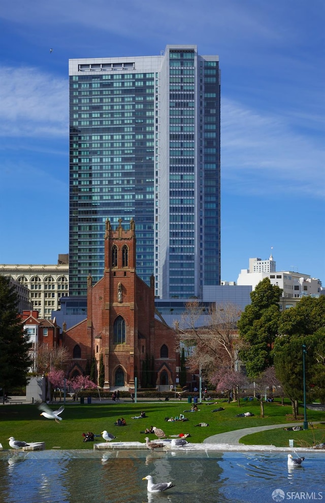 view of building exterior featuring a water view