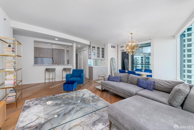 401 Harrison St Unit 23C, San Francisco, CA 94105 - living room with a chandelier, light wood finished floors, and recessed lighting