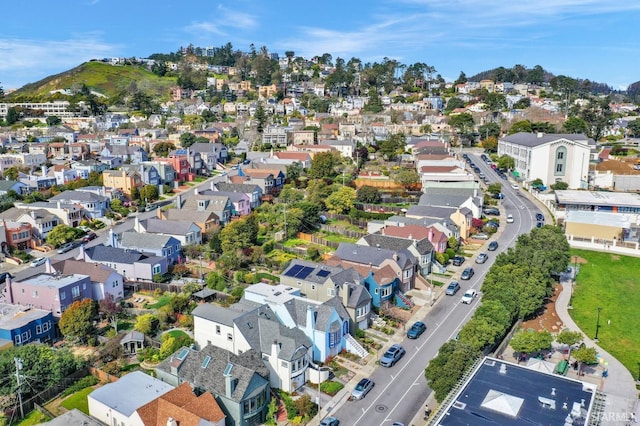 birds eye view of property with a residential view