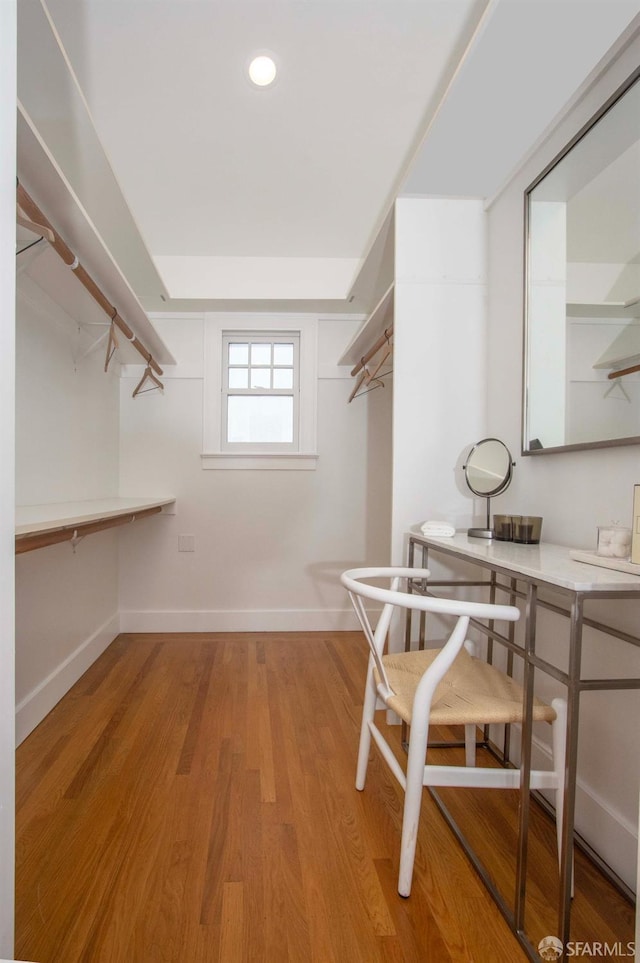 spacious closet with light wood-style flooring