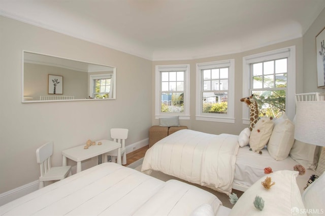 bedroom featuring baseboards