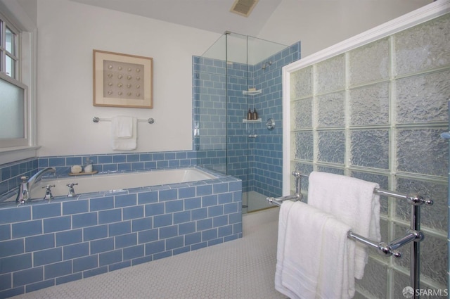 full bath featuring a garden tub, visible vents, tile patterned floors, and a stall shower