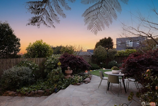 view of patio / terrace with outdoor dining area and a fenced backyard