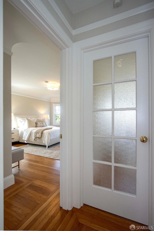 hall featuring wood finished floors