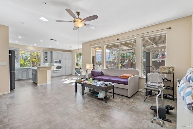 living room featuring ceiling fan