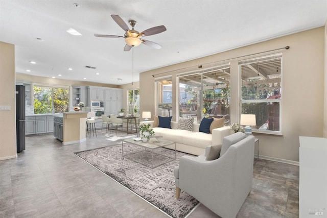 living room with ceiling fan