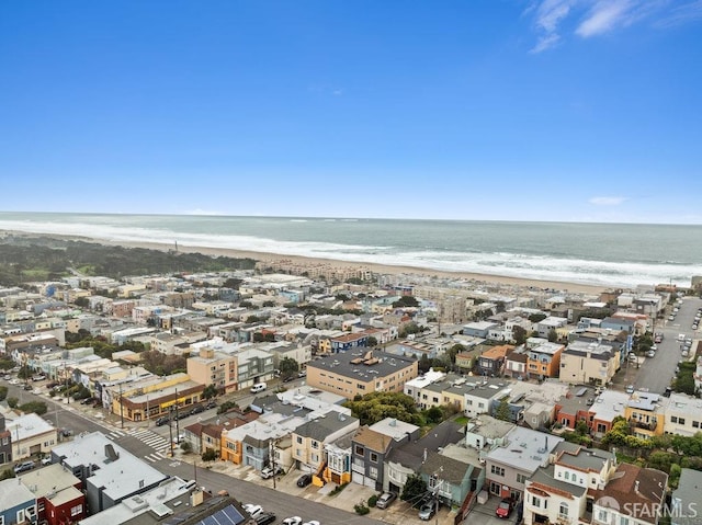 bird's eye view with a beach view and a water view