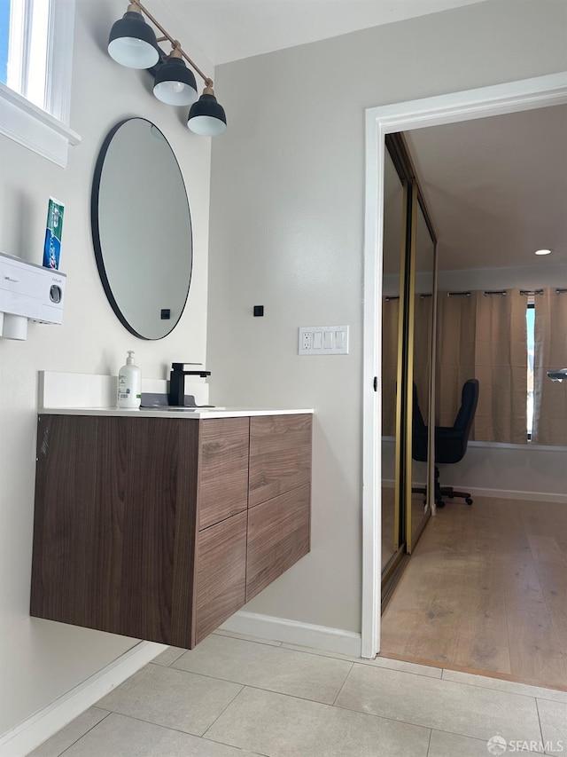 bathroom with vanity and tile patterned flooring