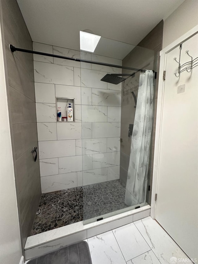 bathroom featuring a shower with curtain