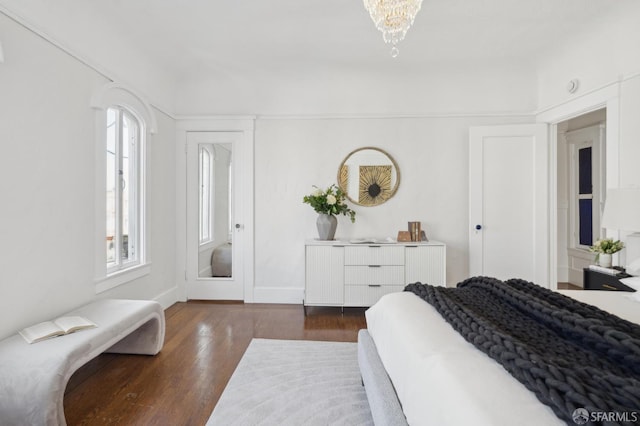 5 College Ter, San Francisco, CA 94112 - bedroom featuring dark wood-type flooring, baseboards, and a chandelier