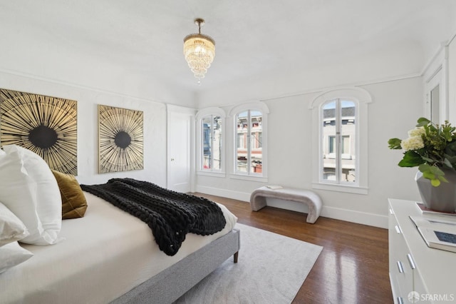 5 College Ter, San Francisco, CA 94112 - bedroom featuring baseboards, dark wood-style flooring, and a chandelier