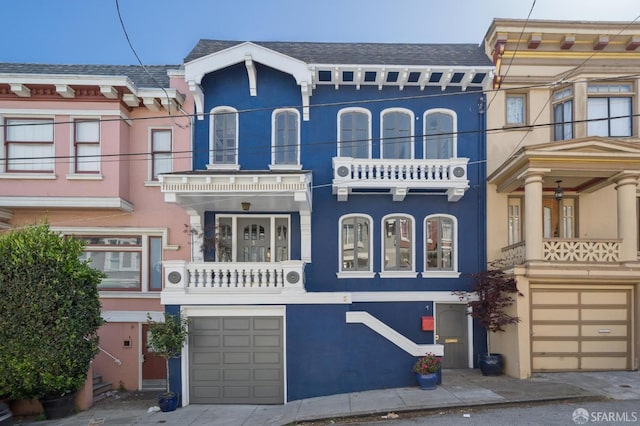 5 College Ter, San Francisco, CA 94112 - view of property featuring an attached garage, stucco siding, and a balcony