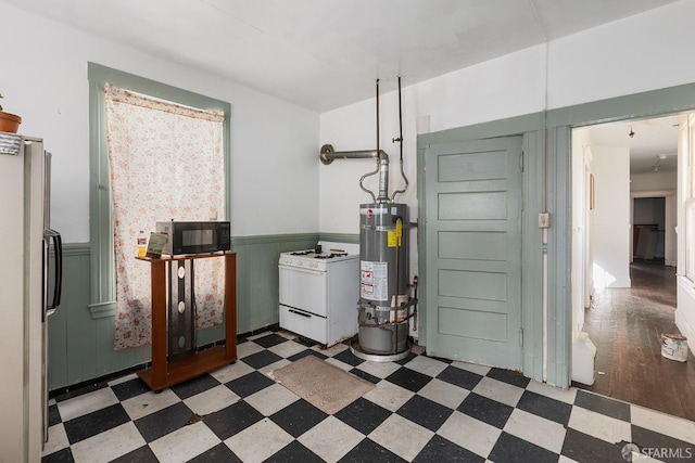 utility room featuring secured water heater