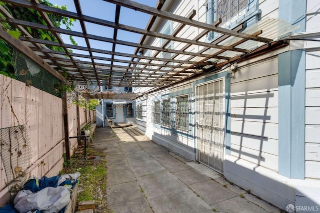 view of home's exterior with fence