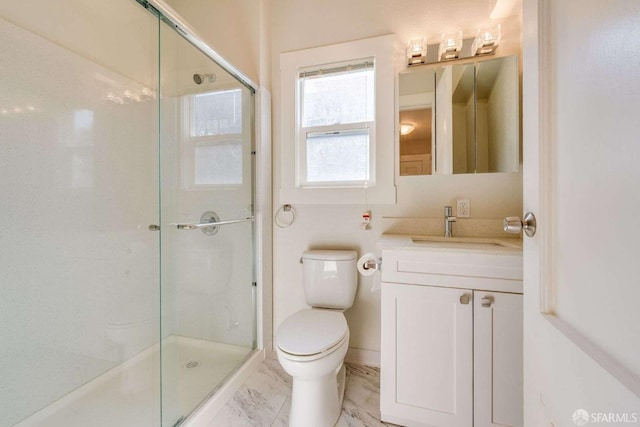 bathroom featuring a shower stall, marble finish floor, vanity, and toilet