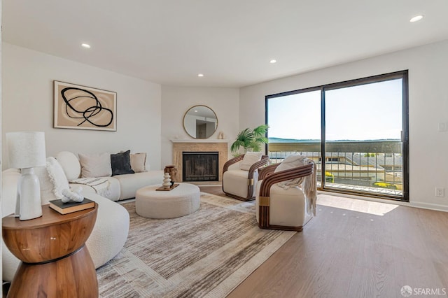 611 Stonegate Dr, South San Francisco, CA 94080 - living room with wood finished floors, recessed lighting, and a fireplace