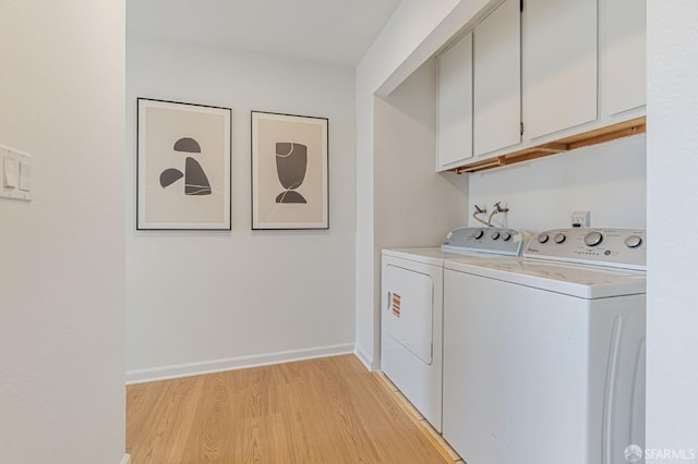 611 Stonegate Dr, South San Francisco, CA 94080 - laundry area featuring cabinet space, separate washer and dryer, light wood-style flooring, and baseboards