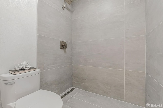 611 Stonegate Dr, South San Francisco, CA 94080 - bathroom featuring toilet and tiled shower