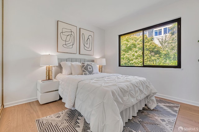 611 Stonegate Dr, South San Francisco, CA 94080 - bedroom with baseboards and light wood-style floors