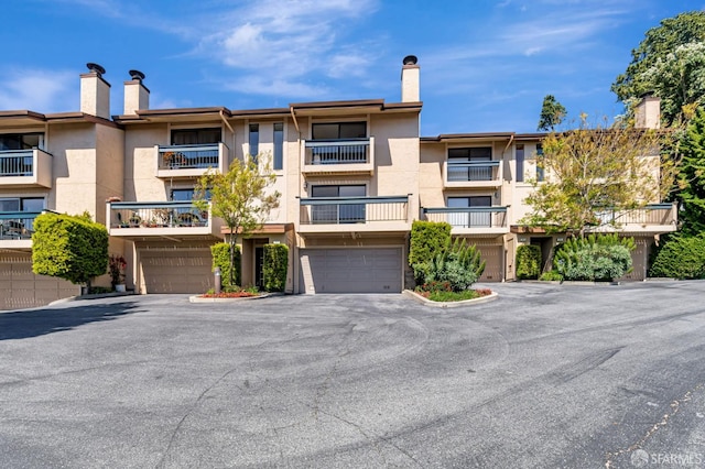 611 Stonegate Dr, South San Francisco, CA 94080 - view of apartment building / complex with a garage