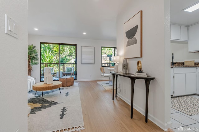 611 Stonegate Dr, South San Francisco, CA 94080 - living area featuring baseboards, light wood-type flooring, and recessed lighting