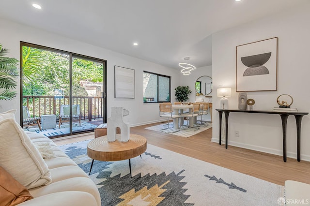 611 Stonegate Dr, South San Francisco, CA 94080 - living area featuring wood finished floors, baseboards, recessed lighting, and a chandelier