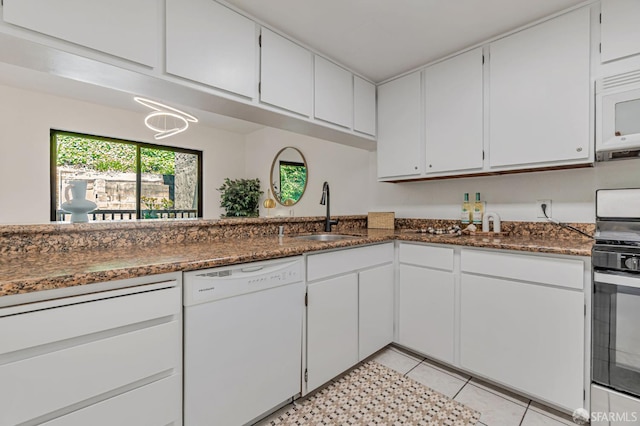 611 Stonegate Dr, South San Francisco, CA 94080 - kitchen featuring white appliances, a sink, white cabinetry, dark stone countertops, and light tile patterned floors