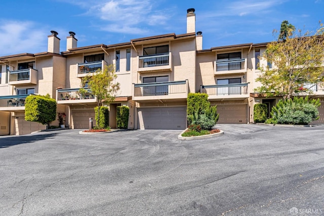 611 Stonegate Dr, South San Francisco, CA 94080 - view of apartment building / complex with a garage