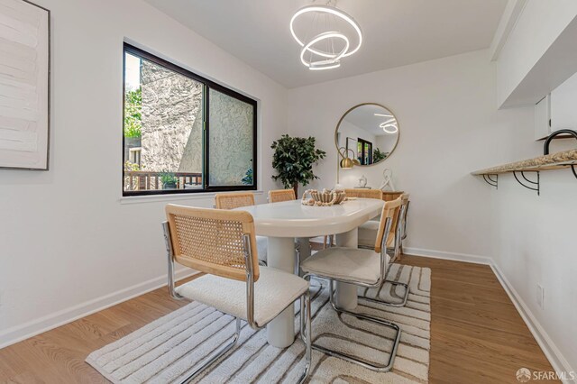 611 Stonegate Dr, South San Francisco, CA 94080 - dining area with wood finished floors and baseboards