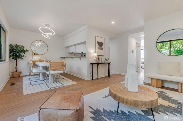 611 Stonegate Dr, South San Francisco, CA 94080 - living room with wood finished floors, baseboards, and recessed lighting