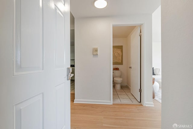 611 Stonegate Dr, South San Francisco, CA 94080 - hallway with light wood-style flooring and baseboards