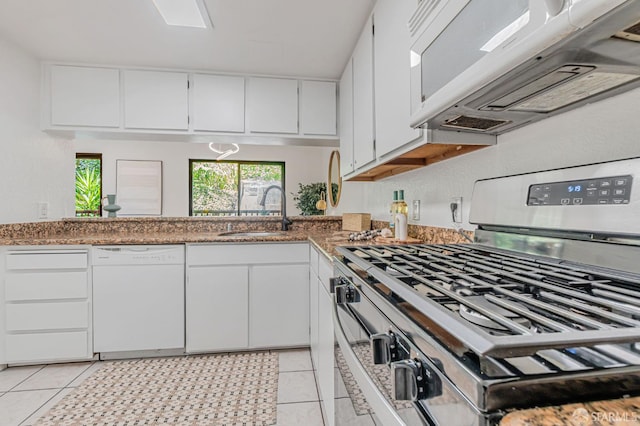 611 Stonegate Dr, South San Francisco, CA 94080 - kitchen featuring white appliances, a sink, light tile patterned floors, and white cabinets