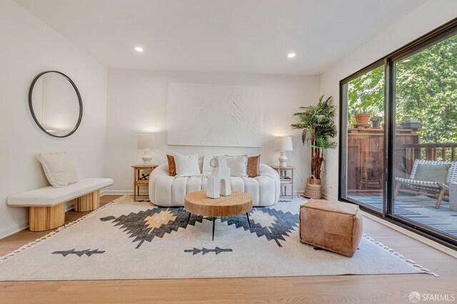 611 Stonegate Dr, South San Francisco, CA 94080 - living room with wood finished floors, baseboards, and recessed lighting