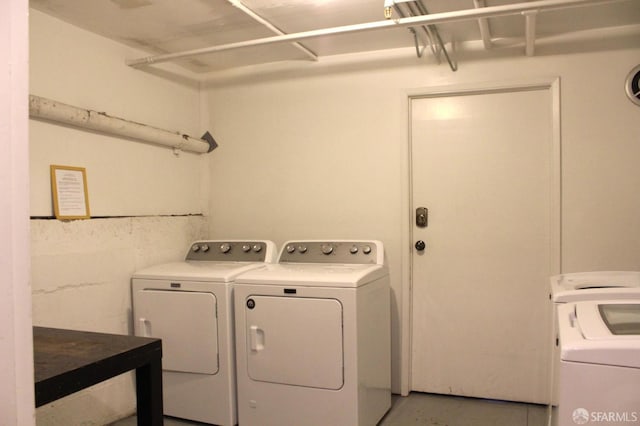 1155 Leavenworth St Unit 7, San Francisco, CA 94109 - washroom with independent washer and dryer and concrete block wall