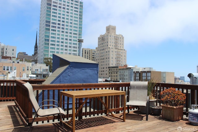 1155 Leavenworth St Unit 7, San Francisco, CA 94109 - wooden terrace featuring a city view