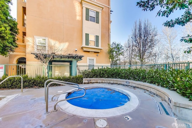 view of pool featuring a patio area