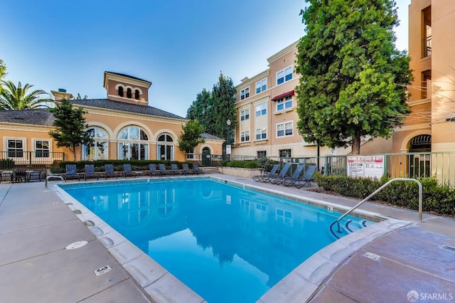 view of swimming pool featuring a patio