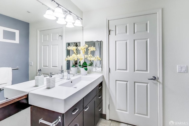 bathroom featuring vanity and tile patterned flooring