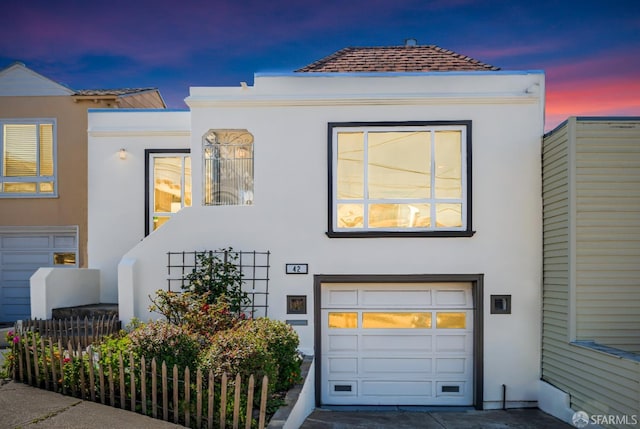 42 Stoneybrook Ave, San Francisco, CA 94112 - view of front of house featuring stucco siding and an attached garage