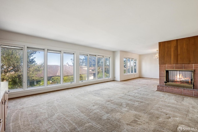 37 San Jacinto Way, San Francisco, CA 94127 - unfurnished living room with carpet, a brick fireplace, and a chandelier