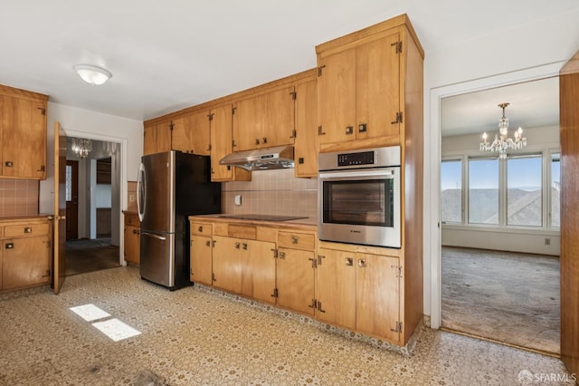 37 San Jacinto Way, San Francisco, CA 94127 - kitchen featuring appliances with stainless steel finishes, under cabinet range hood, a chandelier, tasteful backsplash, and light countertops