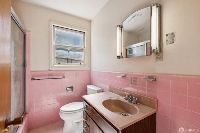 37 San Jacinto Way, San Francisco, CA 94127 - bathroom with tile walls, vanity, a shower with shower door, and wainscoting