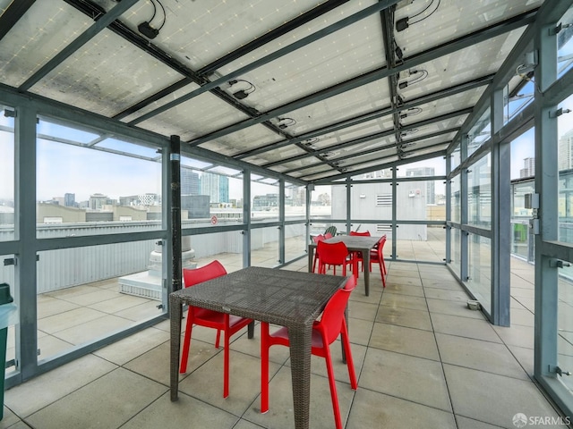 766 Harrison St Unit 711, San Francisco, CA 94107 - sunroom with a city view and outdoor dining area