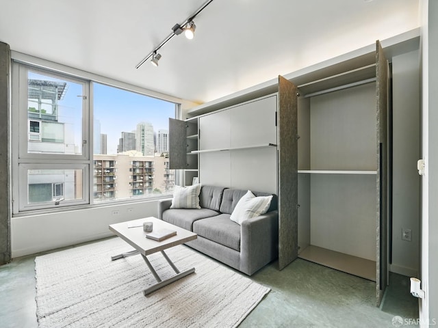 766 Harrison St Unit 711, San Francisco, CA 94107 - living room with concrete floors, healthy amount of natural light, and a view of skyline