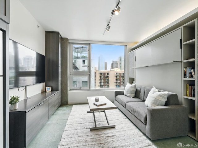 766 Harrison St Unit 711, San Francisco, CA 94107 - living area with a skyline view and finished concrete floors