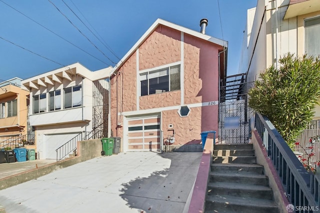 view of front of property featuring a garage