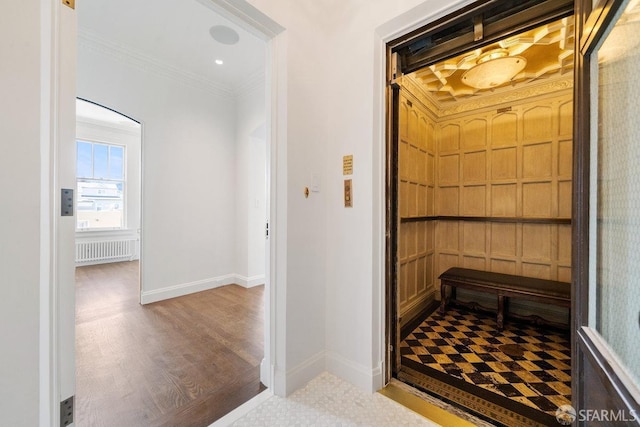 2500 Steiner St Unit 3, San Francisco, CA 94115 - corridor featuring radiator heating unit, ornamental molding, and wood finished floors