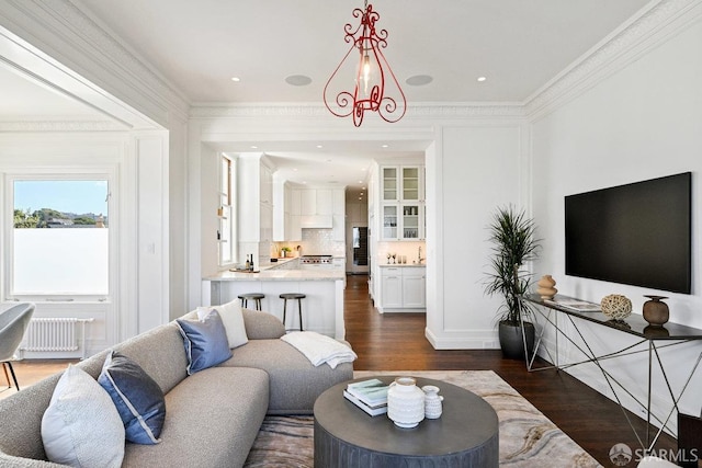 2500 Steiner St Unit 3, San Francisco, CA 94115 - living room with dark wood-style flooring, radiator heating unit, and crown molding