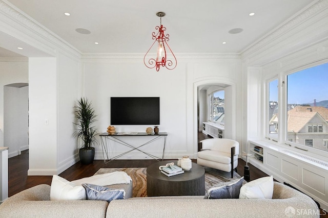 2500 Steiner St Unit 3, San Francisco, CA 94115 - living room featuring arched walkways, wood finished floors, and crown molding