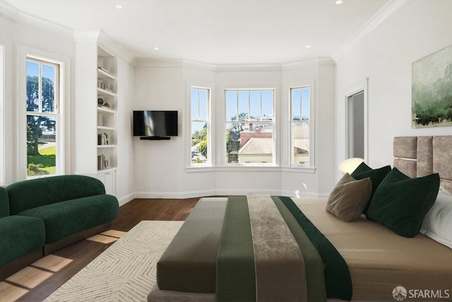 bedroom featuring ornamental molding and dark wood-type flooring